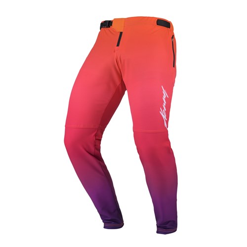 Kenny Racing Prolite Pants / Paint Maker: Ultra-light stretch pants with a gradient from orange to purple, featuring black zippered pockets and a white logo on the left thigh.