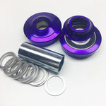 A set of Purple Profile USA Bottom Bracket Kit bearings and rings on a white surface, featuring sealed bearings.