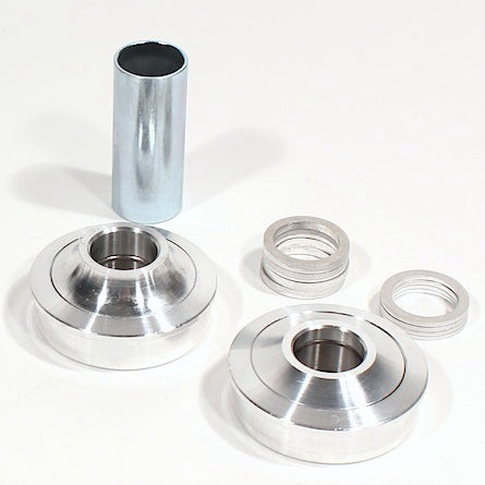 A set of Profile USA Bottom Bracket Kit and a nut for American BB shells.