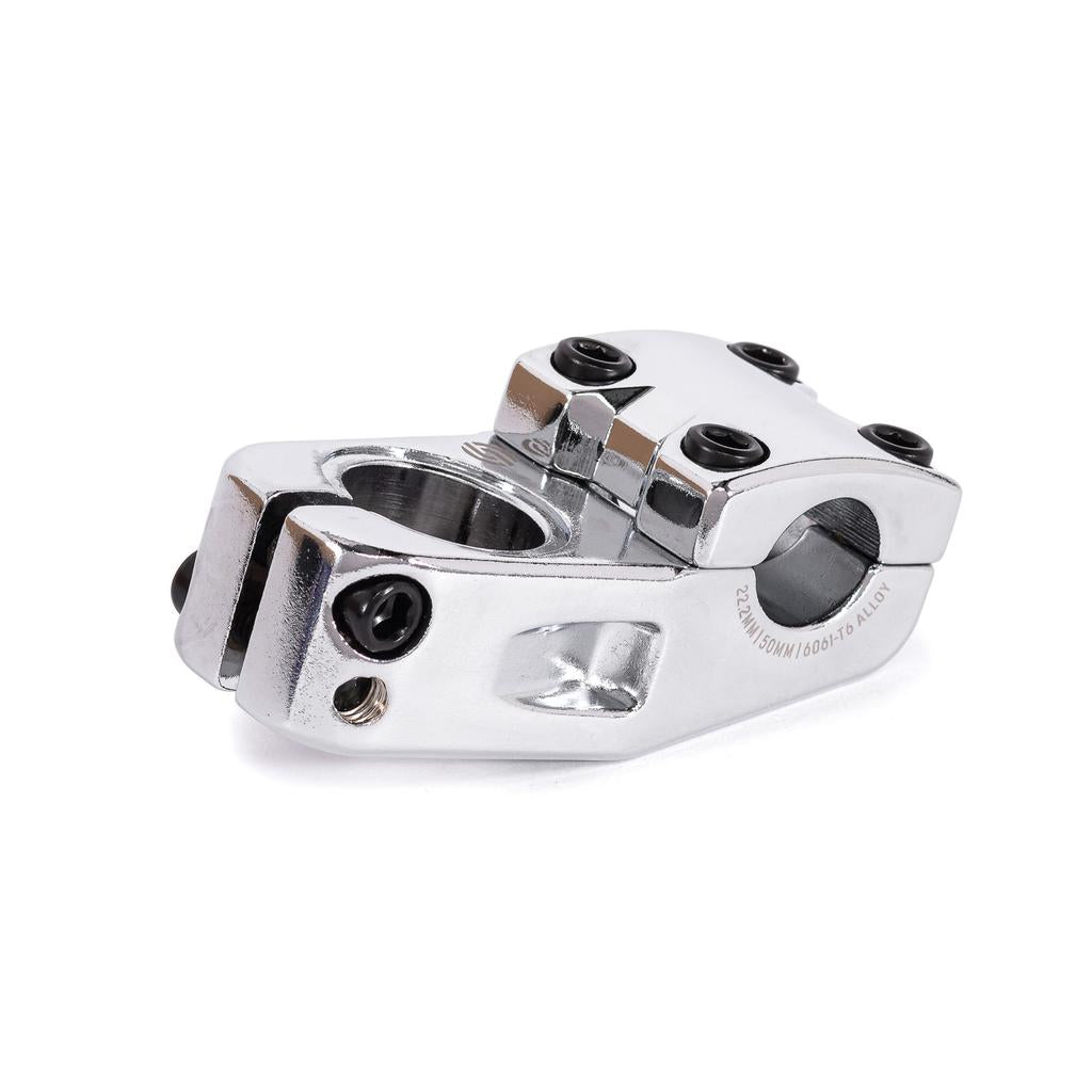 The Salt Am V2 Top Load Stem (22.2mm Clamp) is a chrome BMX bike stem crafted from durable 6061 T6 alloy, featuring four black bolts on top and two on the side, along with shark tooth clamping for a secure handlebar-to-fork attachment.