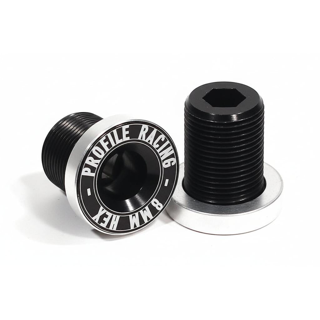 A pair of black Profile BB Flush Mount Bolt 8mm Kit (Suit Column), crafted from 7075 aluminium with silver edges and "Profile Racing 8 MM Hex" engraving, are shown against a white background—ideal for the 22mm Column crank axle.