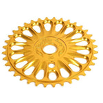 The Profile Imperial Sprocket is a gold-colored BMX sprocket with 25 teeth and circular cut-out holes, expertly crafted by Profile Racing.