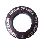 A circular adapter with text that reads: "Profile Sabre Sprocket Insert 19MM SPLINE DRIVE." The dark-colored adapter, featuring a toothed inner ring, is compatible with various crank sizes.