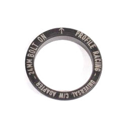 Close-up of a black circular metal adapter engraved with "PROFILE RACING - UNIVERSAL CMW ADAPTER - 24MM BOLT ON," designed for seamless integration with the Profile Sabre Sprocket Insert.