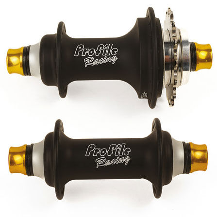 The Profile Elite Hubset (F1 Limited Edition) includes two black hubs with gold axle ends, one front and one rear, both displaying the Profile Racing logo in white—perfect for BMX racing with 204 points of engagement.