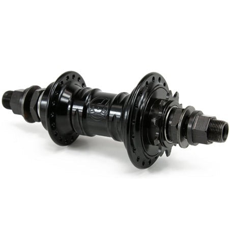 Close-up of a Profile Mini Rear Cassette Hub in black with multiple gear cogs, highlighting its sleek design from an angle.