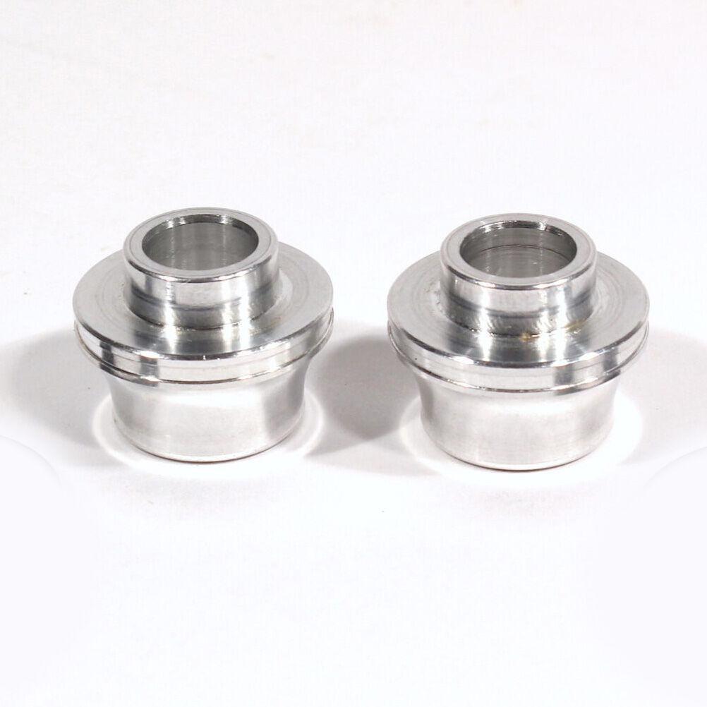 Two identical Profile Hub Volcano Adapters (Pair), featuring cylindrical shapes with flanged edges and crafted from durable 7075 aluminum, are placed side by side on a plain white background.