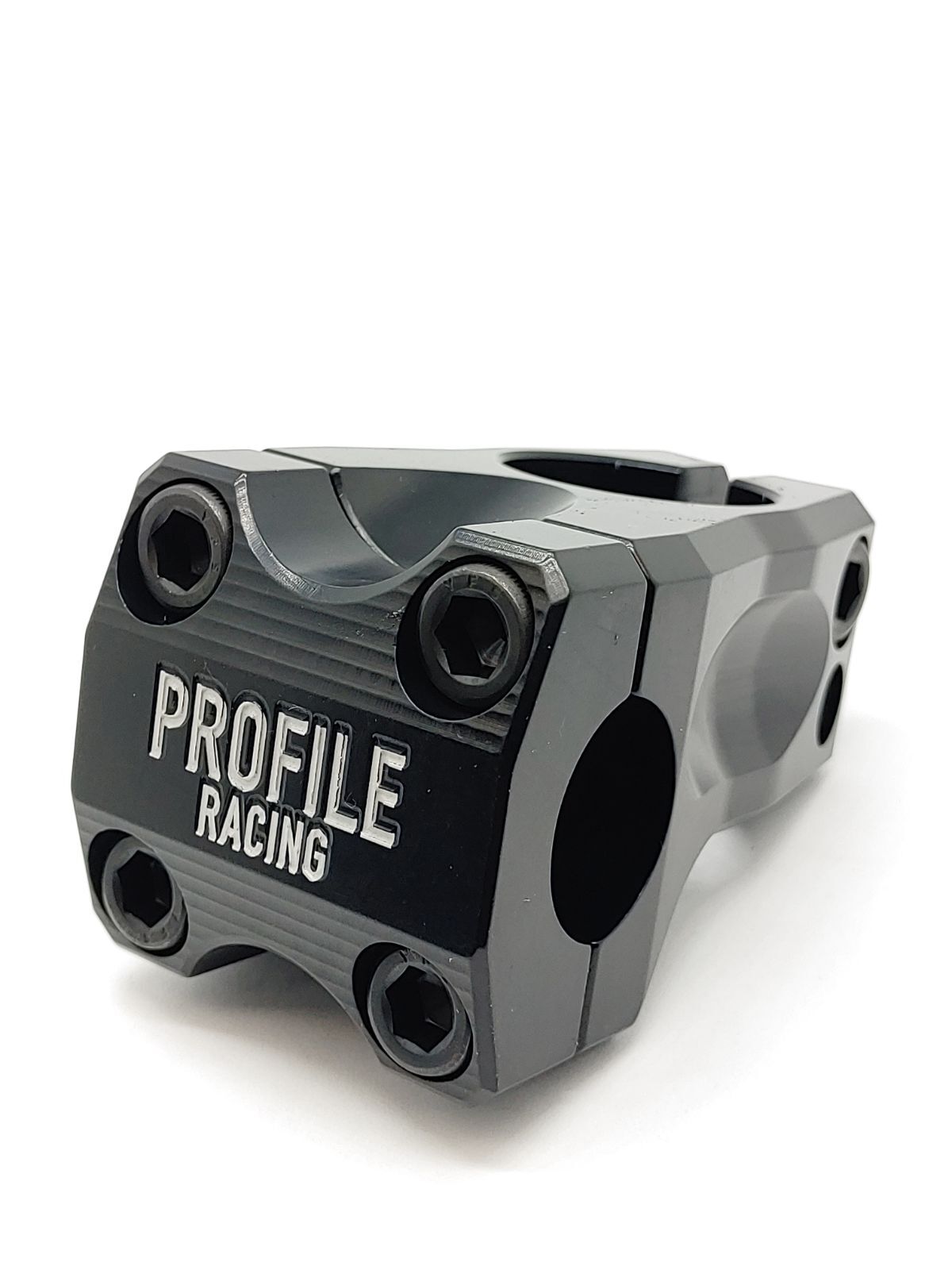 The Profile Acoustic Stem is a black metal front load stem with "Profile Racing" engraved on the faceplate and four bolt holes for secure handlebar attachment—perfect for upgrading your ride.