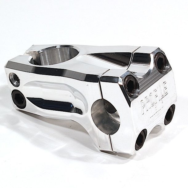 The Profile Acoustic Stem is a polished metal front load BMX stem with four front bolt holes, two side clamps, and engraved "PROFILE" branding, reflecting the quality craftsmanship of Profile Racing.