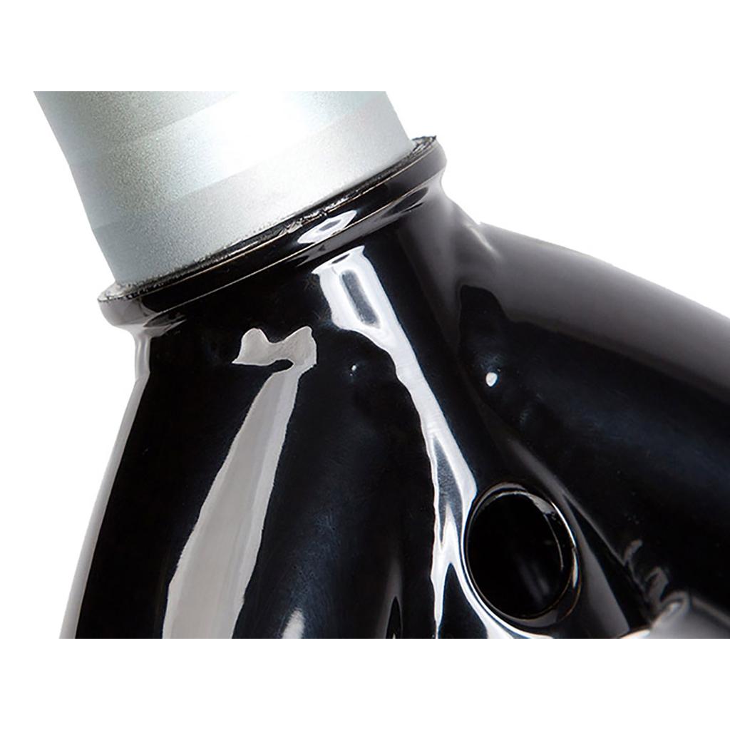 Close-up of a glossy black S&M Race XLT 26 Inch Fork with a metallic joint and circular opening, photographed against a white background.