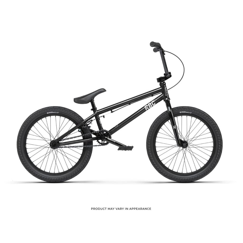 The Radio Saiko 20 Inch Bike, a black kids BMX with a compact frame, single gear, Chromoly three-piece cranks, and thick tires, is shown in side view against a white background.