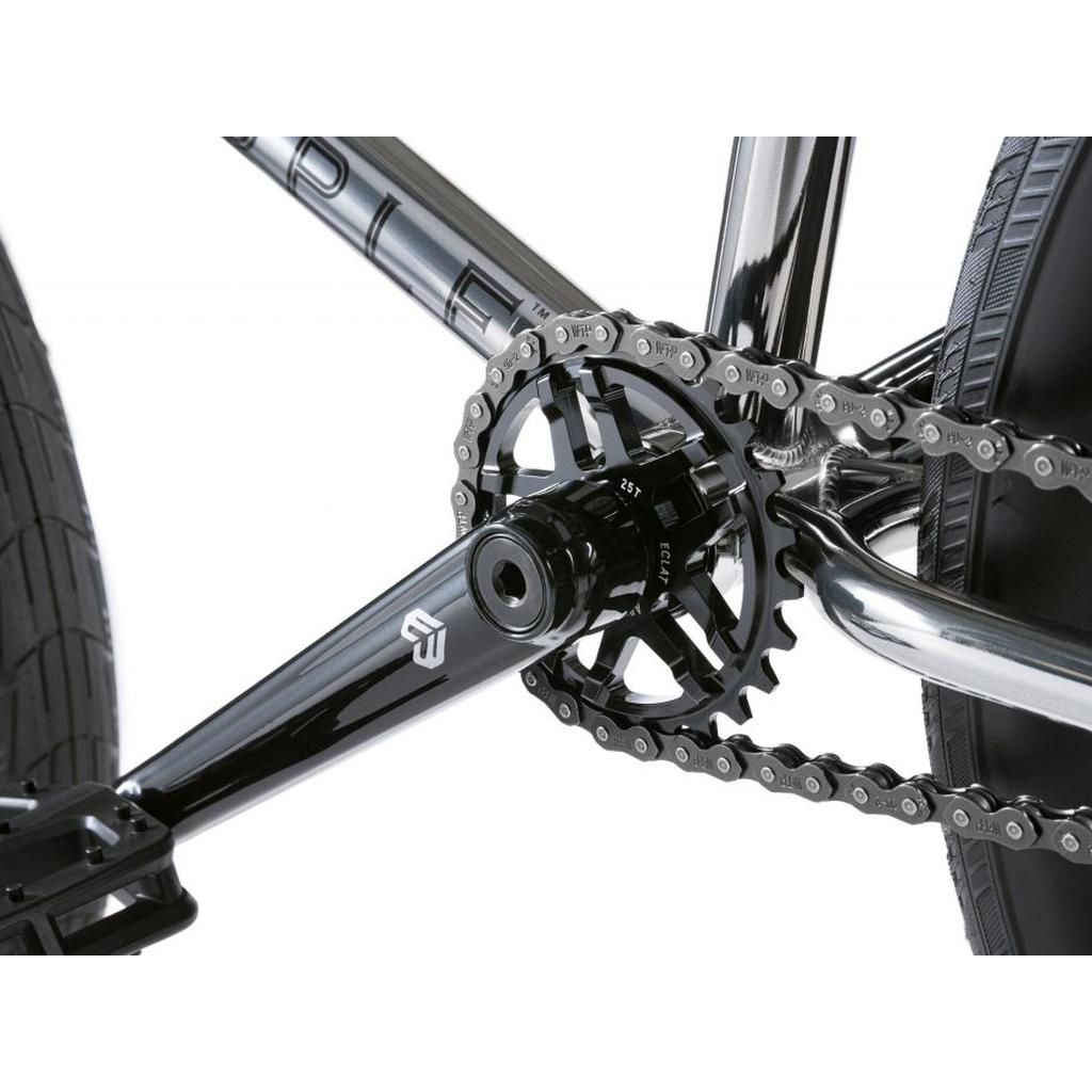 Close-up of a BMX crankset featuring the Eclat Abyss Sprocket, crafted from durable 6061-T6 alloy, with chainring and chain connected to the rear wheel, highlighting detailed metal components.