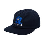 The Sunday S Man Unstructured Cap is a navy blue dome cap with an embroidered blue cartoon "S" character on the front—a fresh cover from Sunday caps.