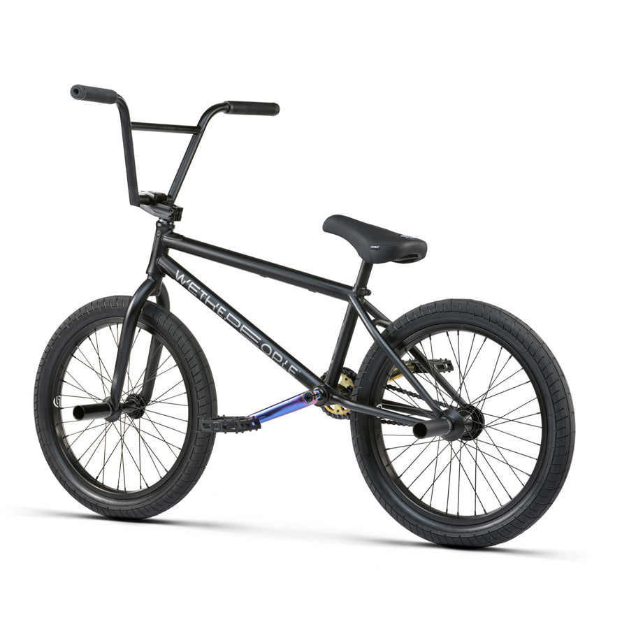 A black Wethepeople Reason 20 Inch BMX bike, a street machine, on a white background.