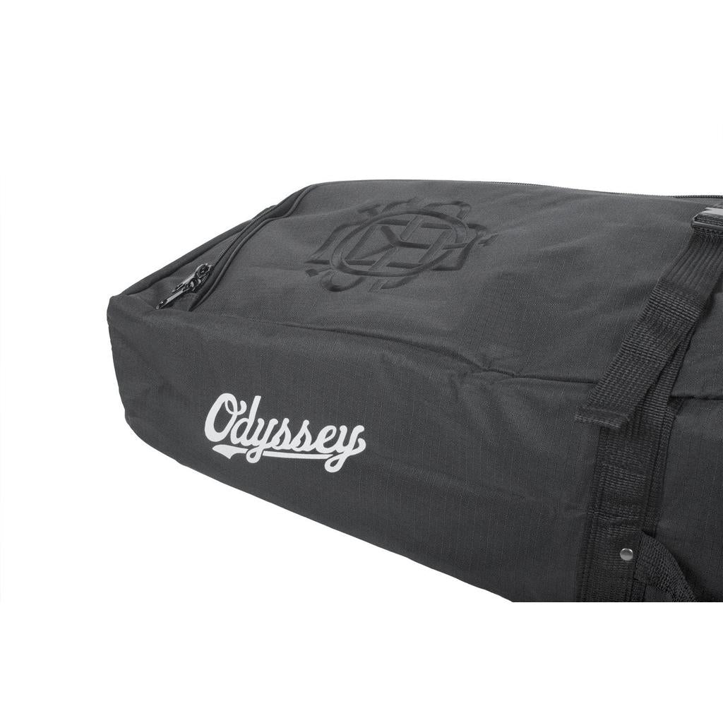 The Odyssey Monogram Bike Bag is a lightweight, stealthy black duffel featuring a white embroidered logo, side pocket, and top woven handle strap.