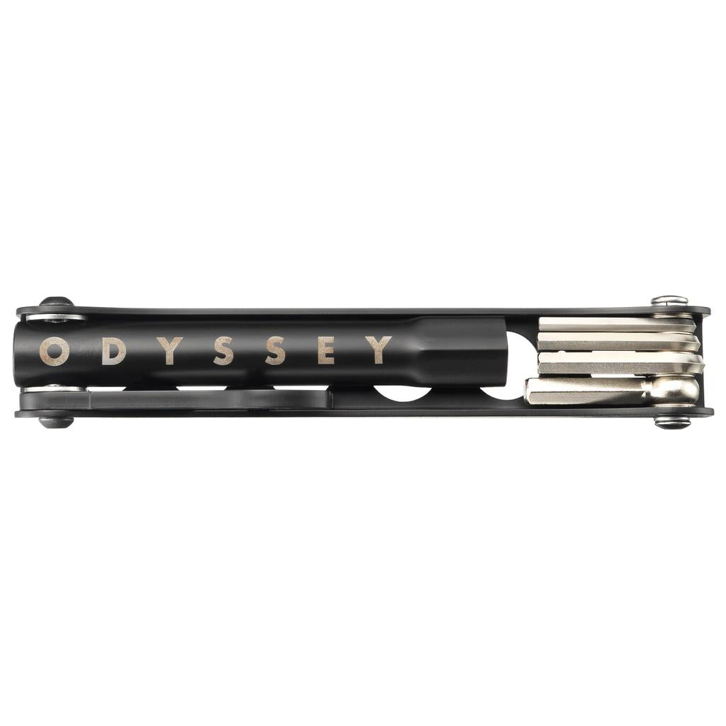 The Odyssey Travel Multi Tool is a compact black bike tool with "ODYSSEY" on the side, featuring multiple fold-out metal hex keys and a built-in pedal wrench for convenient repairs anywhere.