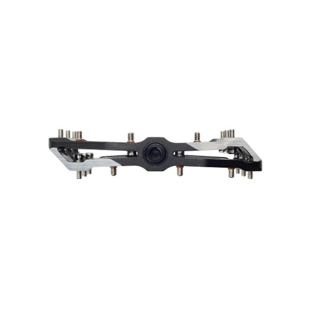 The HT Supreme ANS10 Pedals feature a black and silver alloy body, multiple metal pins, and a central axle—styled as race flat pedals for optimal grip and performance.