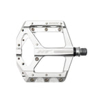 The HT Supreme ANS10 Pedals are silver alloy flats with multiple grip pins, "SUPREME" and "HT" labels, and a threaded spindle—perfect for riders seeking race-level flat pedal performance.