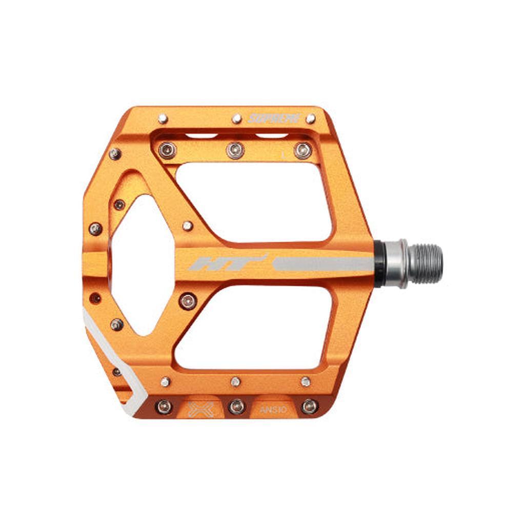 HT Supreme ANS10 Pedals feature a wide alloy body, metal pins for grip, and a silver axle—engineered as the ultimate race flat pedal for mountain biking.