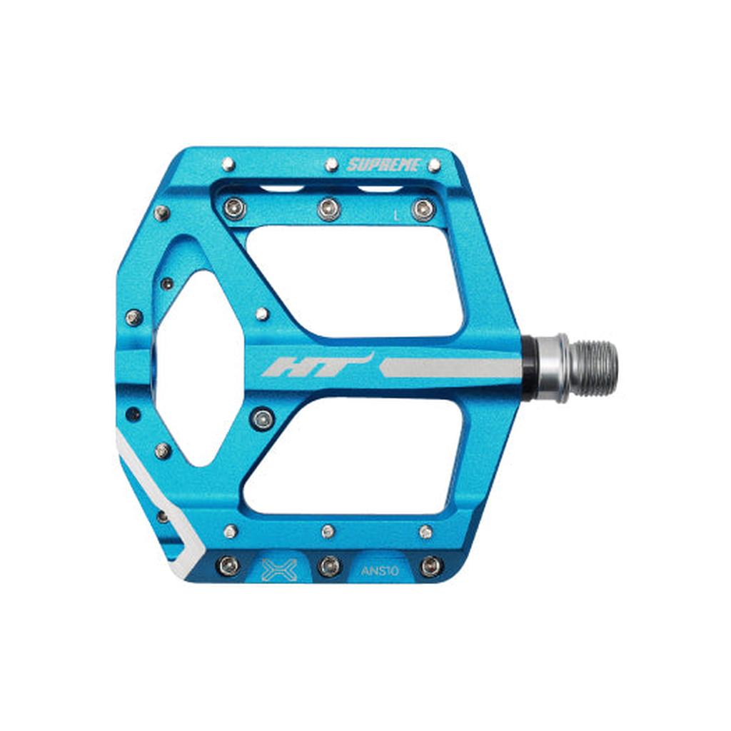 The HT Supreme ANS10 Pedals feature a blue alloy body, metallic pins, silver spindle, and HT branding—engineered to deliver superior grip and performance for demanding riders.