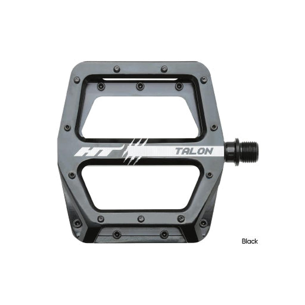 The HT AN71 Talon Pedals feature a wide flat platform, multiple grip pins, and a visible logo across the center.
