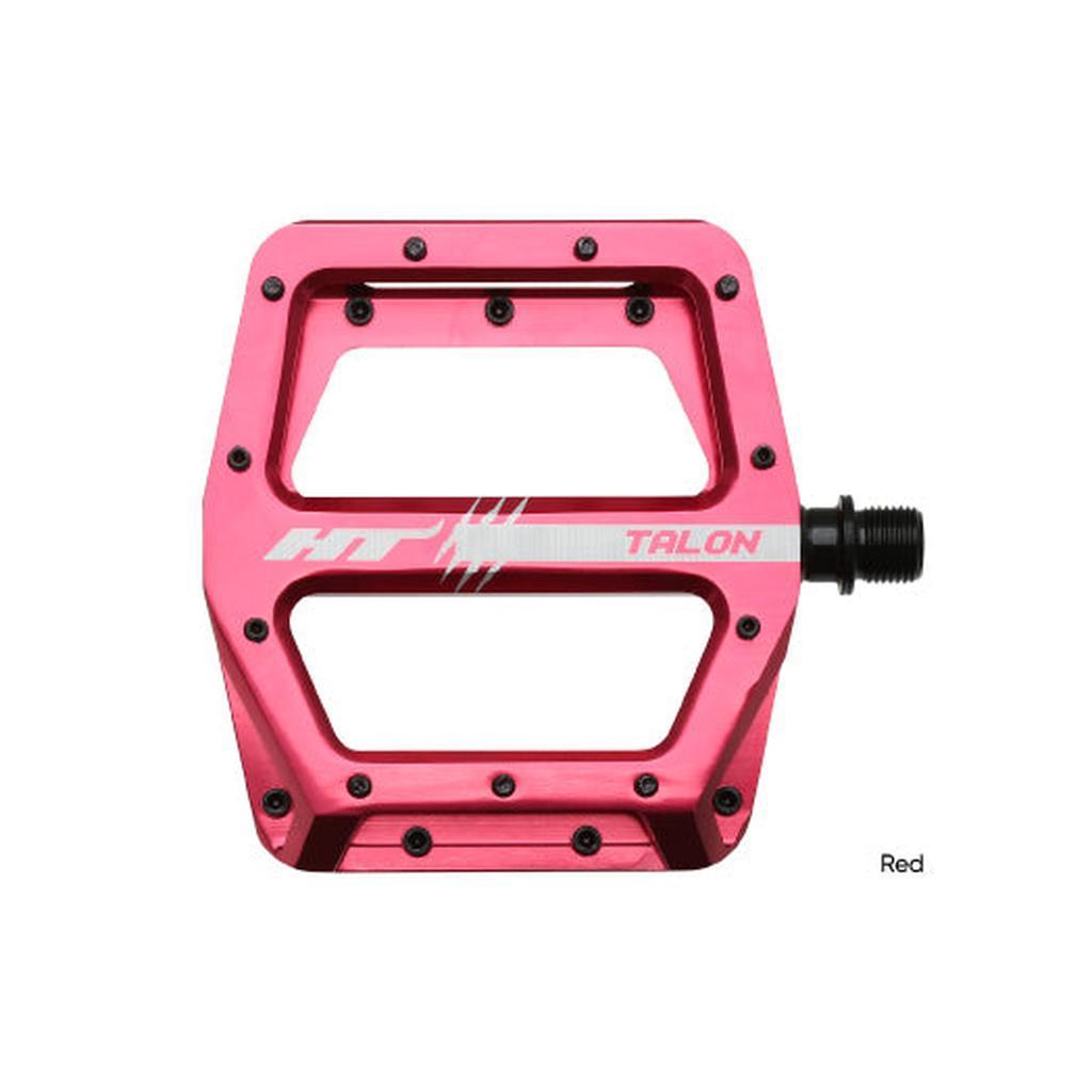 Red flat HT AN71 Talon bicycle pedal with multiple grip pins, viewed from above.