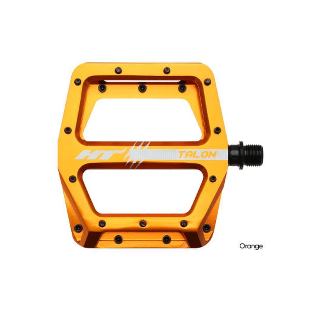 HT AN71 Talon Pedals are orange, rectangular bicycle pedals featuring metal studs and "TALON" branding.