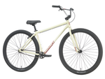 A cream-colored Sunday High C Bike (2026) with a 29" full chromoly frame, black tires, a black seat, and upright handlebars is shown from the side against a white background.
