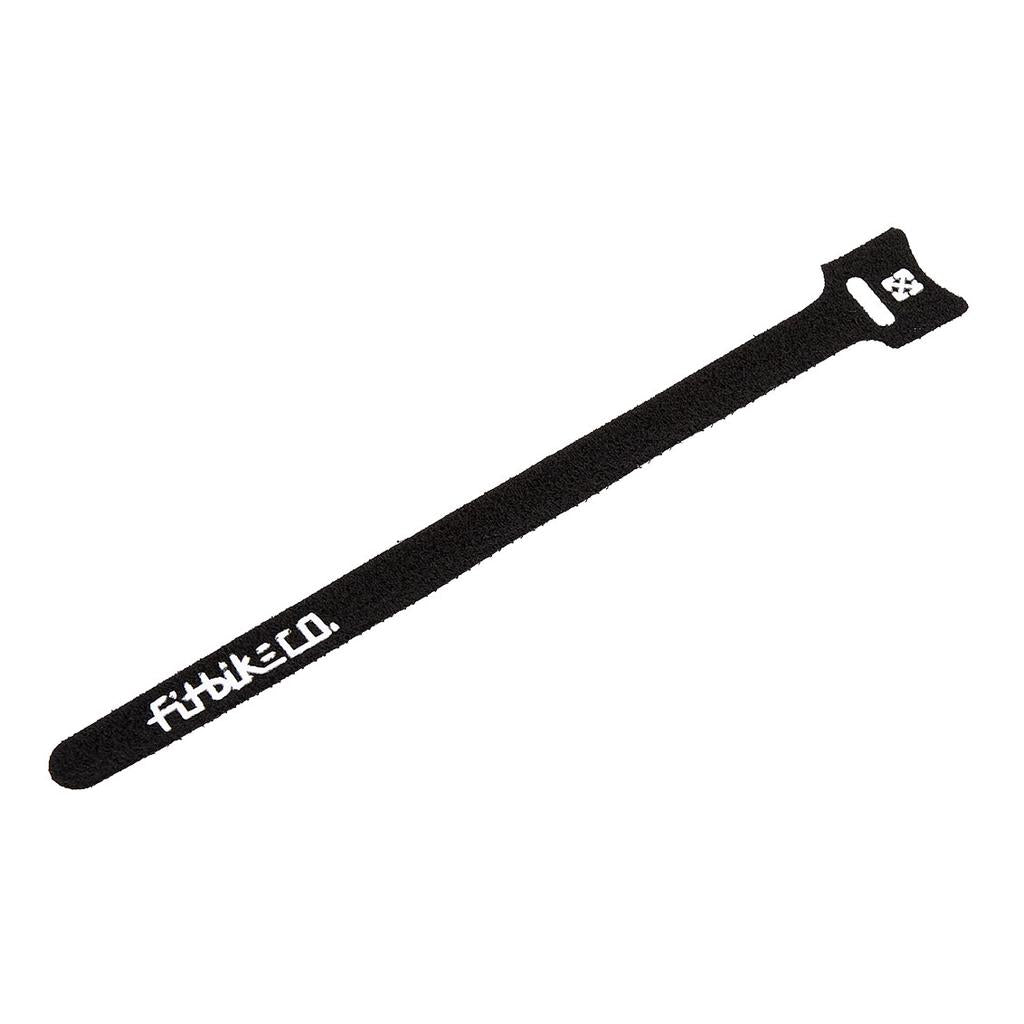 The FITBIKECO Brake Cable Strap is a black reusable Velcro strap with "fubike.co" printed in white—ideal for securing brake cables to your bike frame.