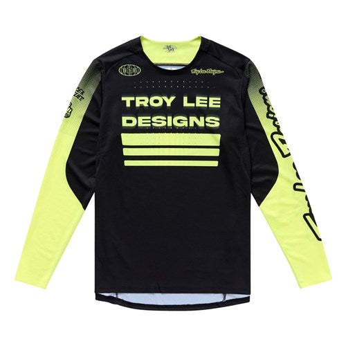 The TLD 25.2 Sprint Jersey / Segment Black features standout black and neon yellow colors with "Troy Lee Designs" branding on the front and sleeves—perfect for racing style and performance.