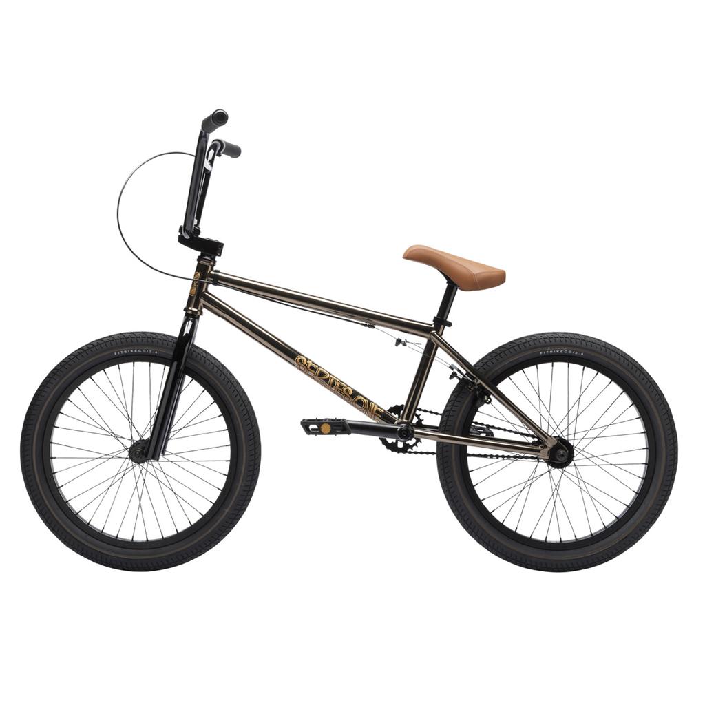 The Fit Bike Co Series One Bike features a Cro-Mo frame, brown saddle, black handlebars, and black wheels, all shown in profile against a white background.