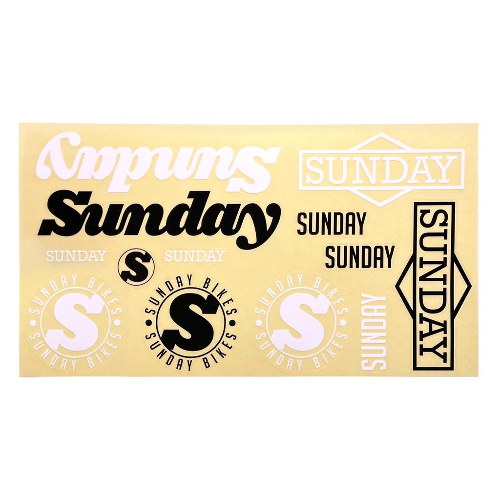 The Sunday Logo Sticker Pack includes 13 assorted "Sunday" and "Sunday Bikes" logo stickers in various fonts, sizes, and colors on a yellow background.