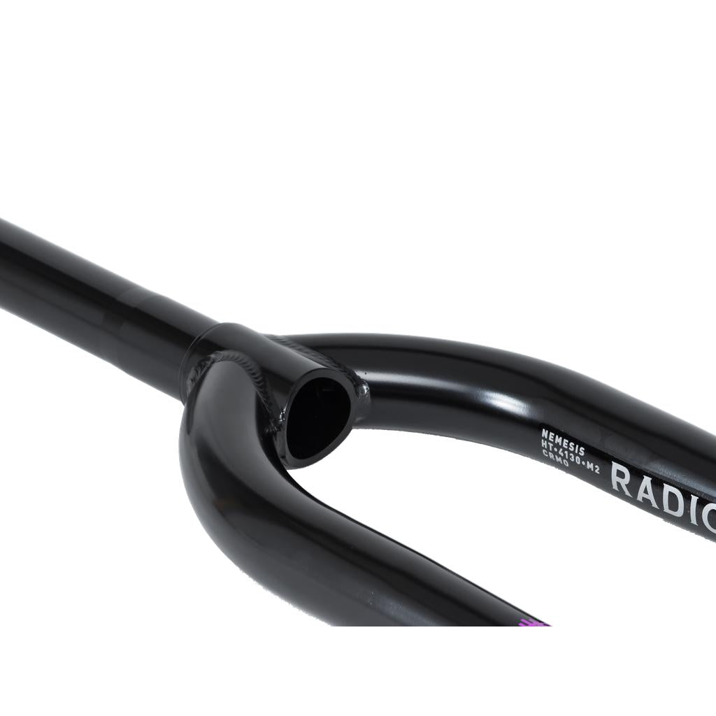 Close-up of Radio Nemesis Forks in black with visible welds on a white background. These heat-treated chromoly forks are built for durability and performance.