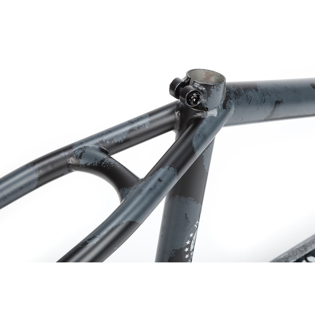 Close-up of a scratched and worn BSD Soulja V3 Frame, focusing on the seat post clamp and invest cast dropouts.