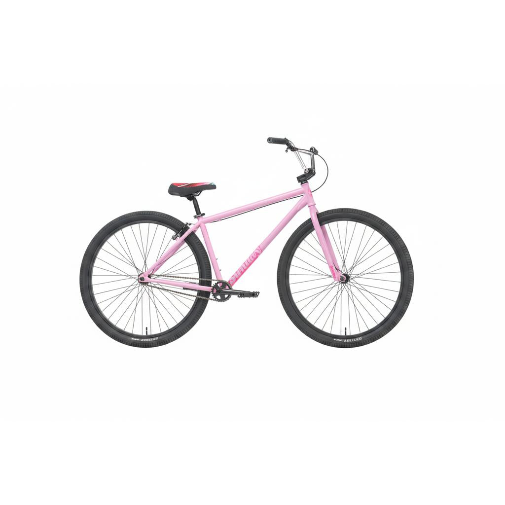 A Sunday High C Bike (2026) in pink, featuring a single-speed 29" full chromoly frame, black tires, a black handlebar, and a black seat with a red accent—displayed on a white background.
