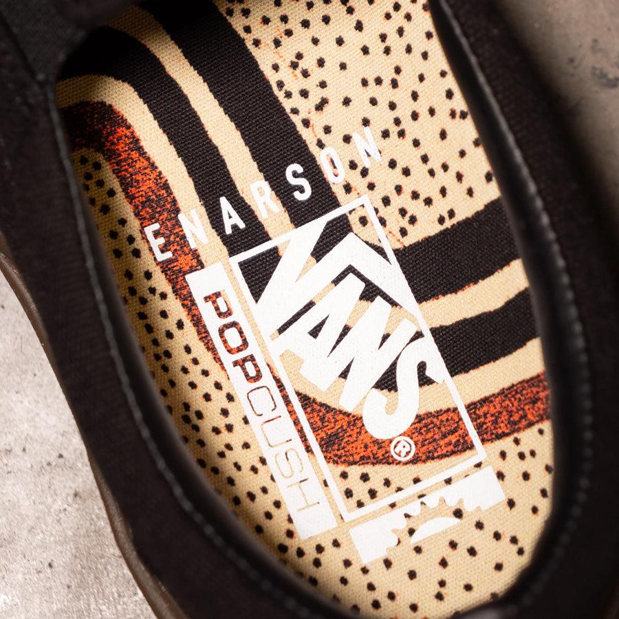 Vans BMX Slip On Shoes (Dennis Enarson) Black/Multi - black & tan shoes known for their durability.