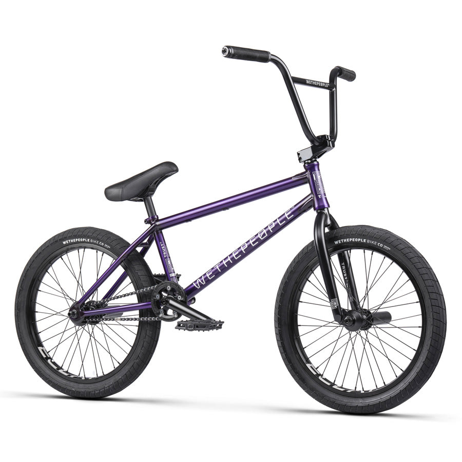 An ultimate performance purple BMX bike with the "Wethepeople Trust 20 Inch Cassette Bike" and Eclat Shift Freecoaster Hub with Hybrid Technology, showcased on a clean white background.