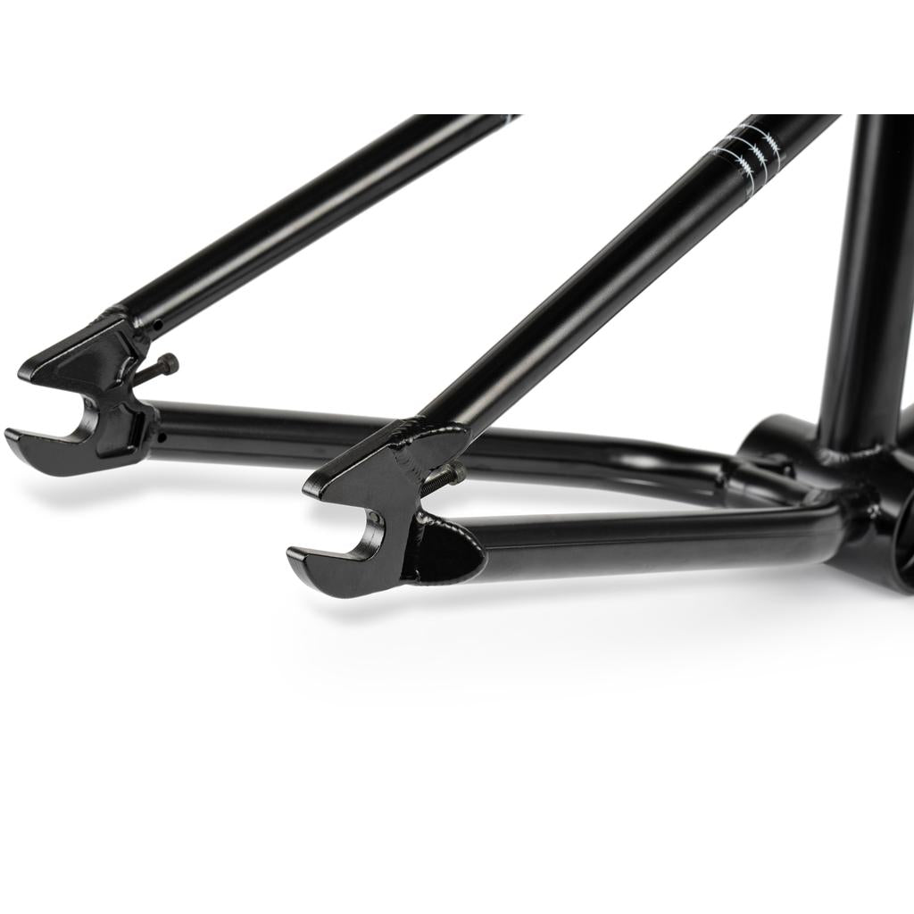 Close-up of the rear dropouts and stays on the Wethepeople Pathfinder Frame, showcasing its black metal build and precise attachment points—designed with inspiration from Felix Prangenberg.