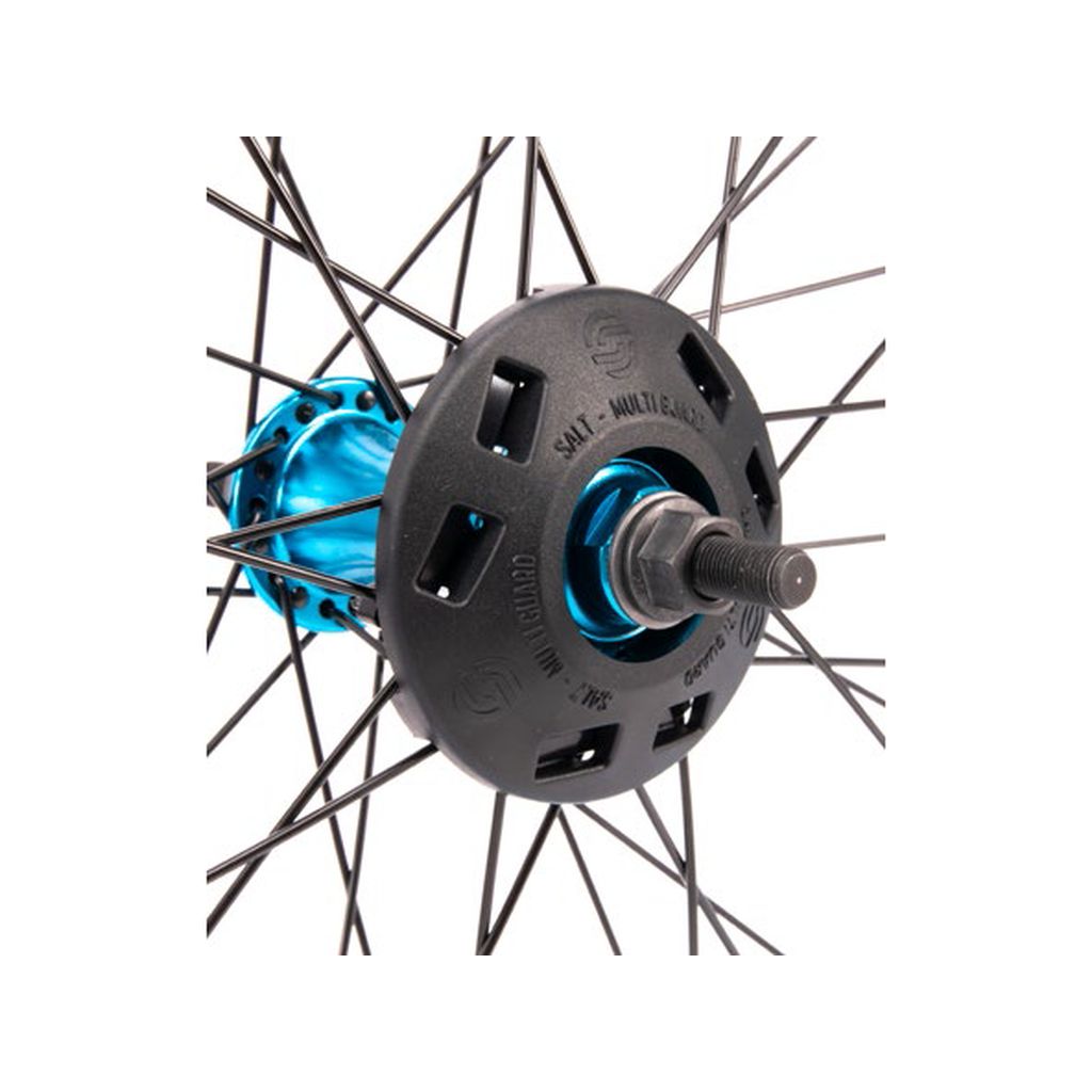 Close-up image of a bicycle wheel hub featuring the Salt Multi Universal Front Hub Guard in black, surrounded by several black spokes radiating from the center. The central hub, strengthened with an injected nylon fiberglass composite, is cyan blue with clear engravings and a protruding axle.