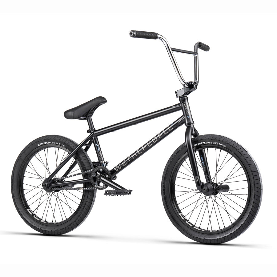 An Ultimate Performance BMX bike featuring the Wethepeople Trust 20 Inch Cassette Bike with a sleek black design, showcased on a clean white background.