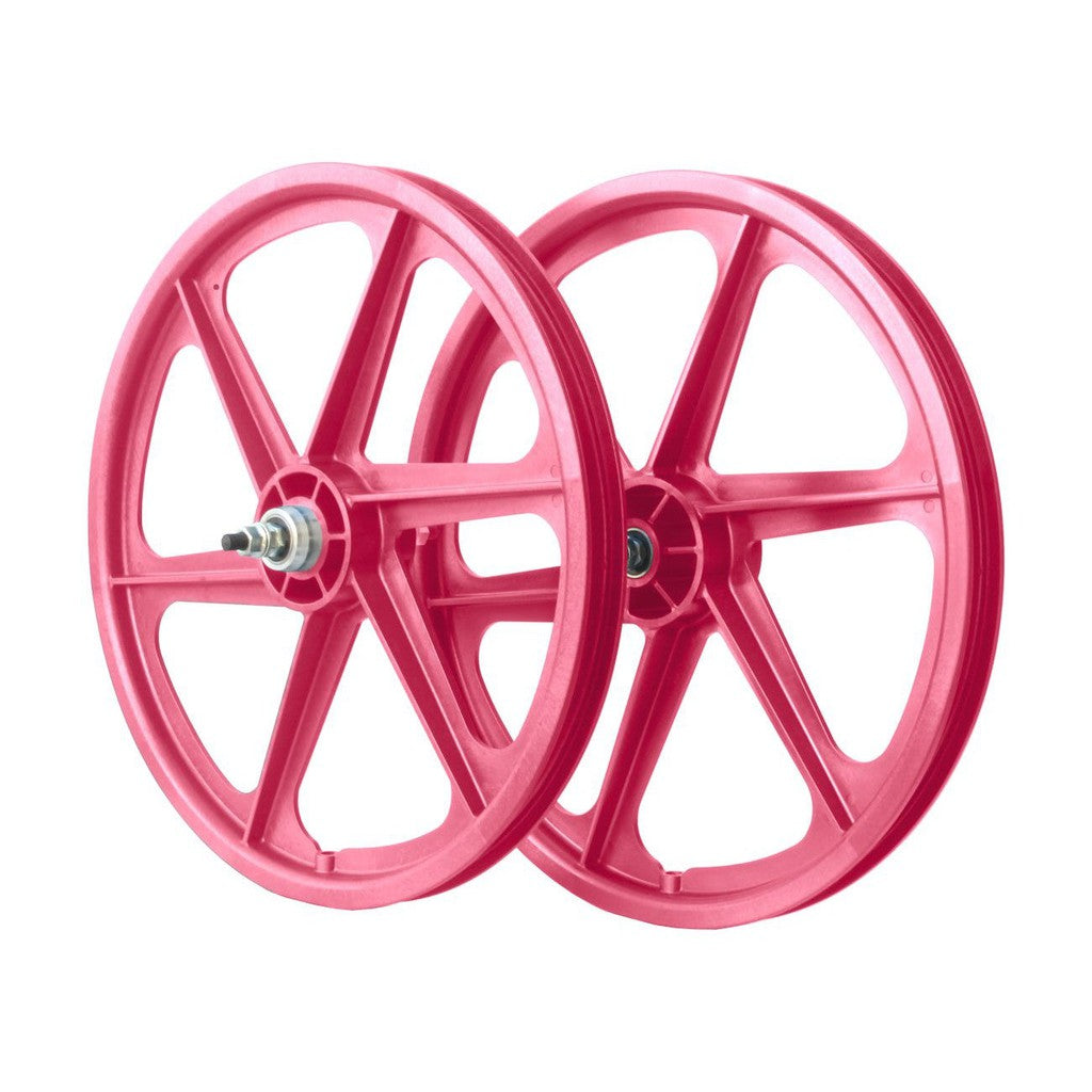 Two Skyway Tuff 6 Spoke Wheelsets on a pink background.