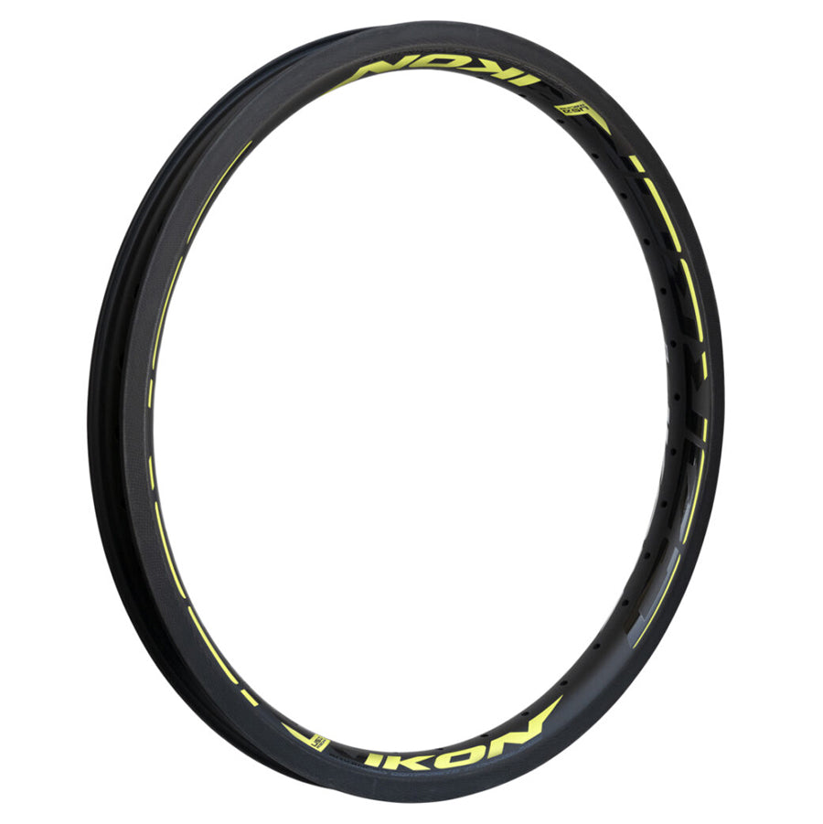 An Ikon Carbon 20 Inch Brake Rim with yellow lettering on it.