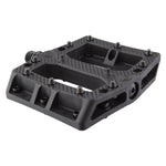The Alienation Foot Fetish Pedal is a black, flat platform pedal crafted from durable thermoplastic and features metal traction pins plus a textured surface for excellent grip, shown from an angled view.