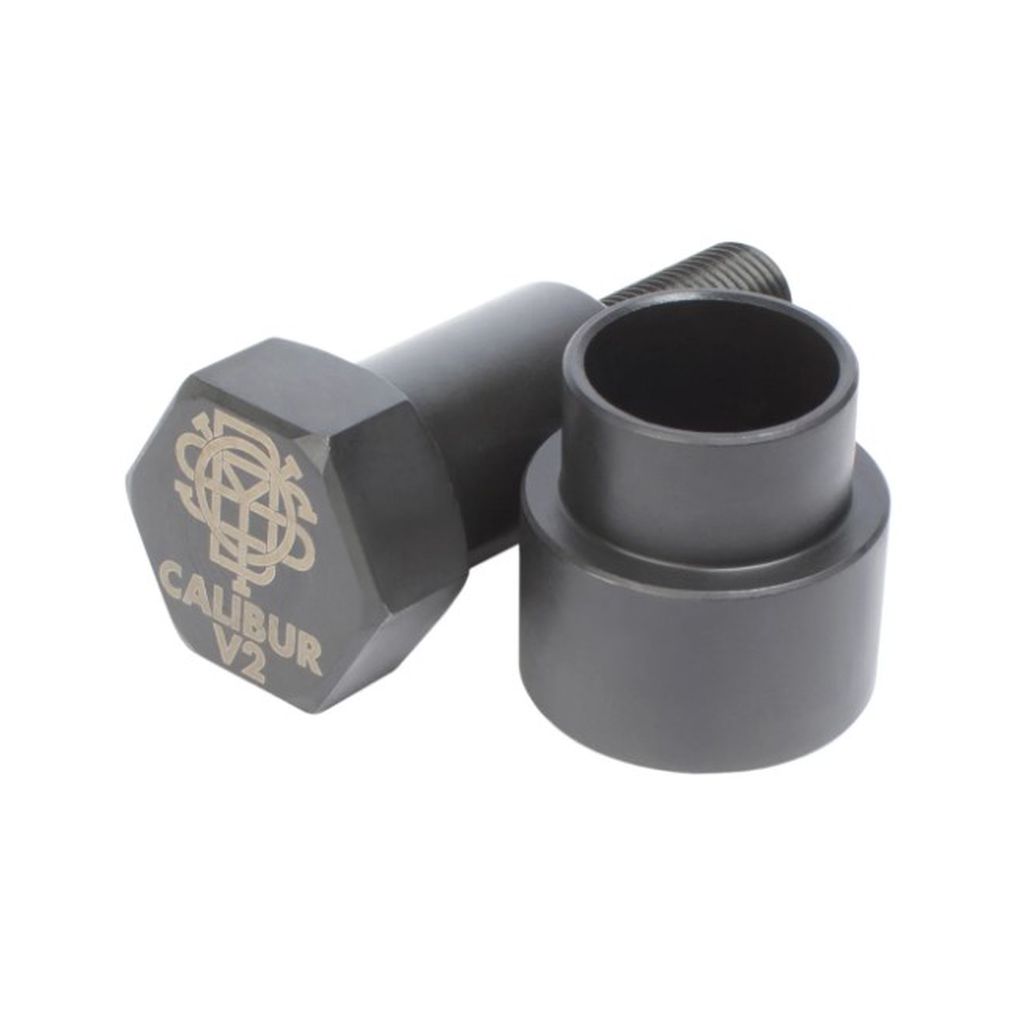 A pair of black metal car accessories labeled "Odyssey Calibur V2 Crank Installation/Removal Tool," featuring a hexagonal-shaped bolt and a cylindrical socket, ideal for use as a Crank Installation/Removal Tool.