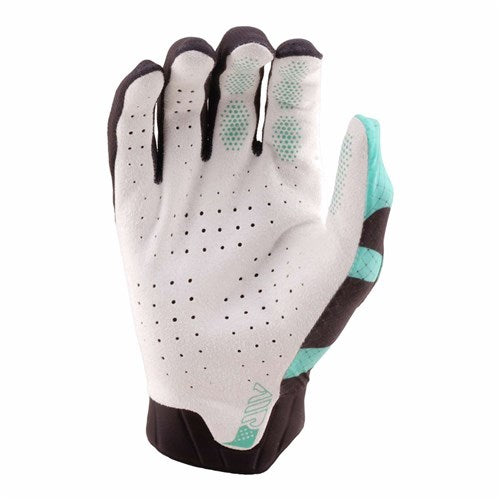 The TLD 26.1 Air Glove / Cyclops Carbon is a white and black mountain bike glove with teal accents, shown from the back, featuring finger perforations, textured grip zones, and a touchscreen-compatible single-layer palm.