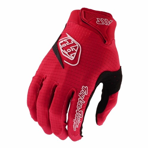 The TLD 26.1 Air Glove (Youth) in Mono Scarlet Glo features a red design with white logo and lettering, black accents, ergonomic fit, and a textured fabric surface.