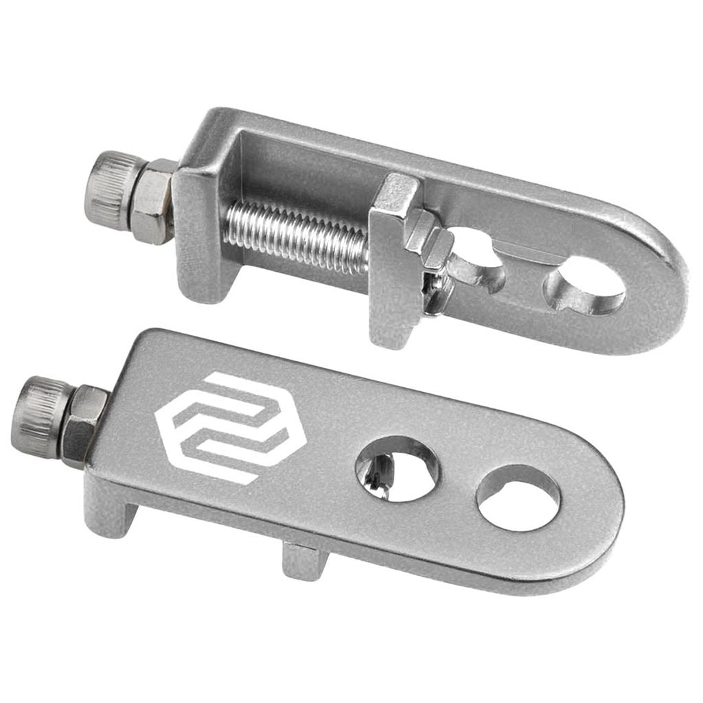 A pair of Promax C-1 Chain Tensioners with a logo on them. Perfect for race bikes and preventing axle slipping.