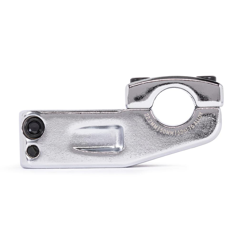 The Salt Am V2 Top Load Stem (22.2mm Clamp) is a silver metal bicycle stem made from durable 6061 T6 alloy, featuring a rounded clamp with two bolt holes for attaching handlebars to the steerer tube. This top load stem delivers reliable strength and stability for your ride.