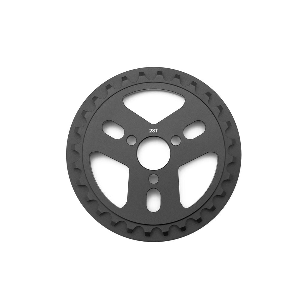 The Cinema Reel Guard Sprocket is a black, circular CNC machined component crafted from 7075-T6 aluminum, featuring a 28T marking and a gear-like edge.