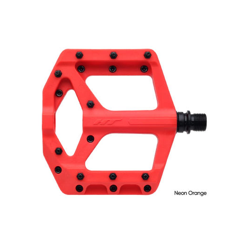 The HT Components Supreme C PA32A Pedals are neon orange flat pedals made from nylon reinforced composite, featuring black replaceable grip pins and axle—offering durability and strong grip, shown from the top against a white background.
